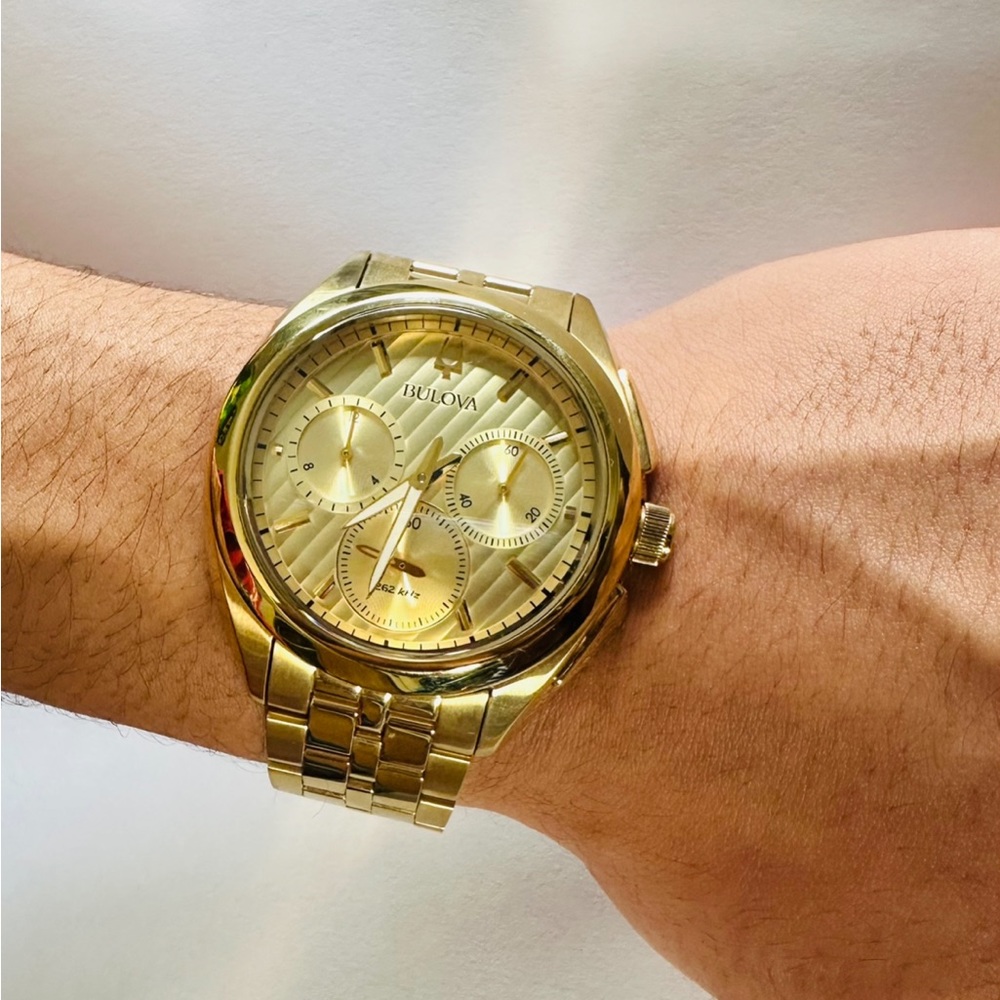 Men’s Bulova Curve gold-tone watch, brand new and 100 percent authentic.